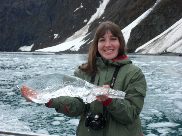 Holding a piece of Harding Glacier