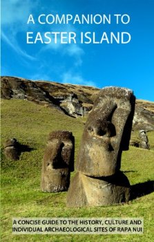 a group of stone statues in a grassy area with Easter Island in the background