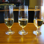 a group of glasses of champagne on a table