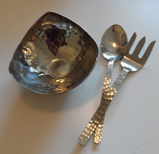 a bowl and spoon with a fork