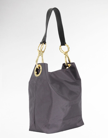 a grey bag with gold rings