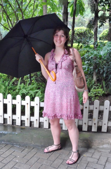 a woman holding an umbrella