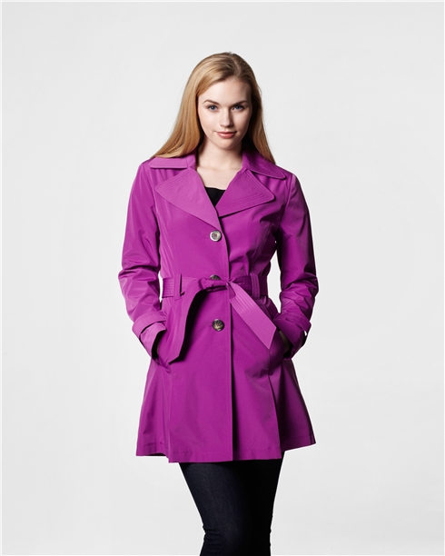 a woman in a purple coat