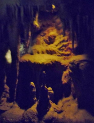 a cave with stalactites and rocks
