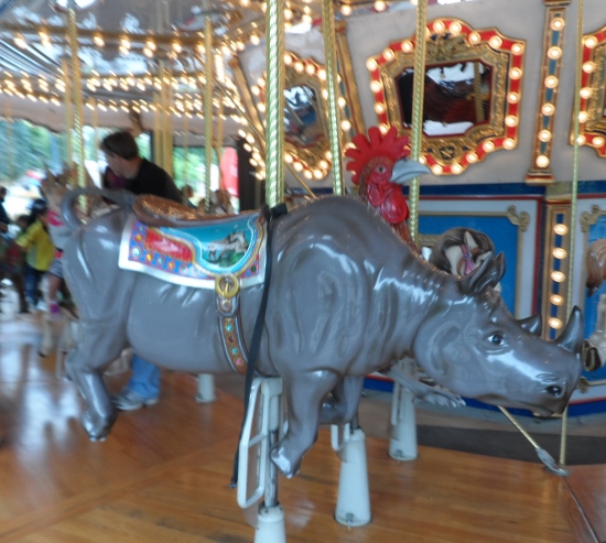 a rhinoceros on a merry go round