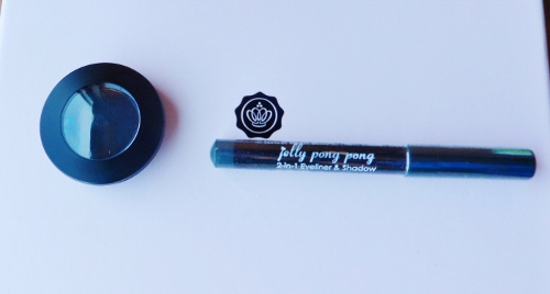 a blue eyeliner and a black container