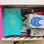 a box with a variety of cosmetics