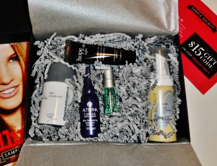 a box with small bottles of cosmetics
