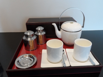 a tray with tea set on it
