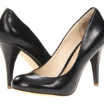 a pair of black high heeled shoes