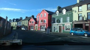 a street with buildings and cars