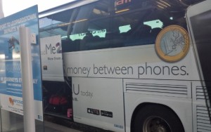 a bus with a large advertisement on the side