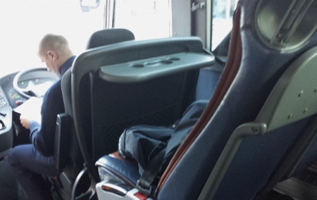 a man sitting in a bus