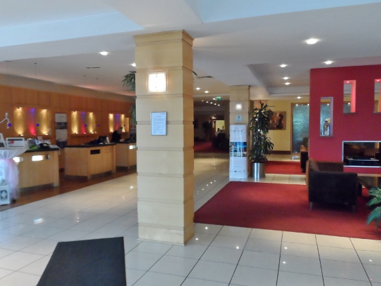 a lobby with a large column
