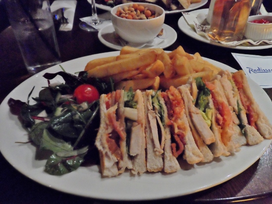 a plate of sandwiches and fries