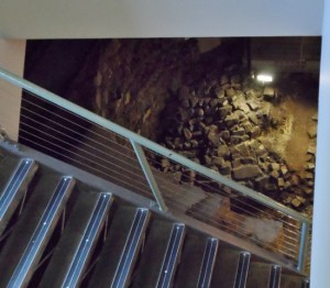 a staircase with rocks in the background