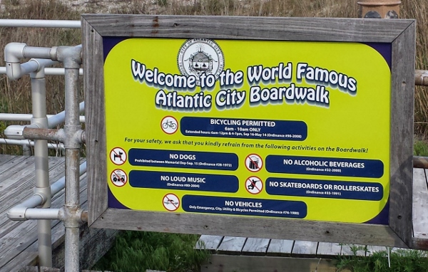 a sign board with text and images