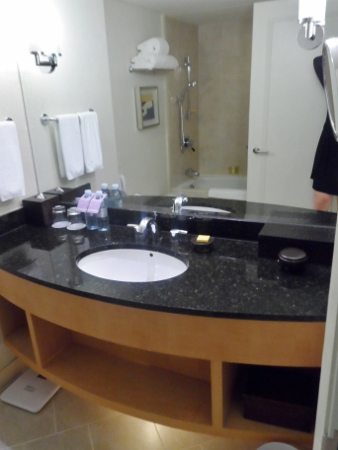 a bathroom with a black countertop
