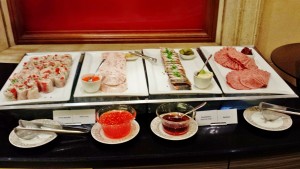 a buffet table with different food items