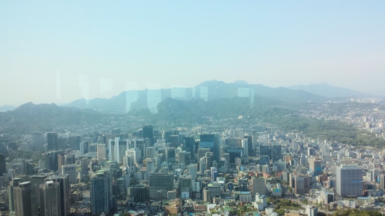 a city with mountains in the background