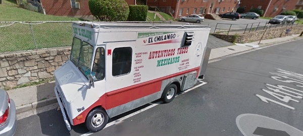 a food truck parked on the street