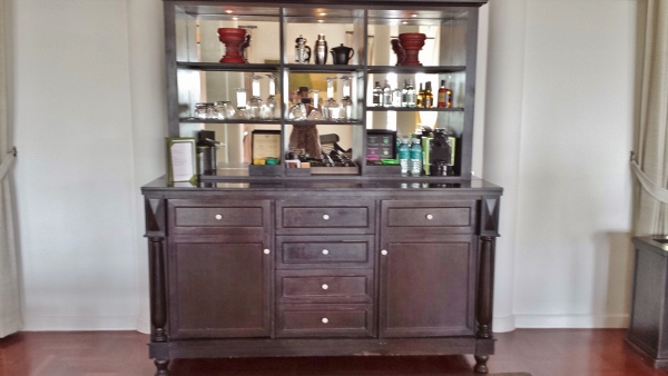 a cabinet with shelves and objects on it