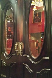 a double door with mirrors