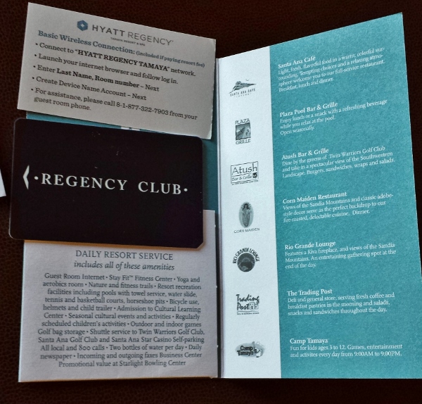 a brochure with a card and a booklet