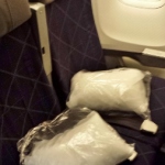 bags of white plastic on a seat