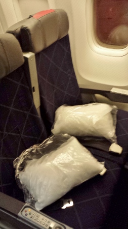 bags of white plastic on a seat