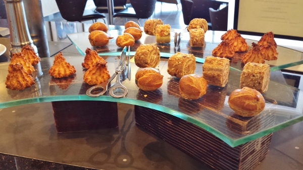a group of pastries on a glass table