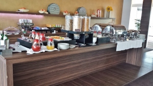 a buffet table with food items on it