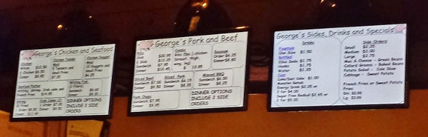 a menu board with a price