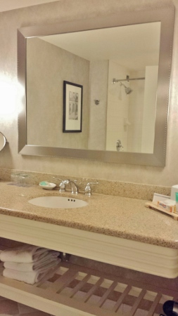 a bathroom with a mirror