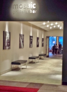 a hallway with benches and lights