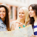a group of women looking at a map