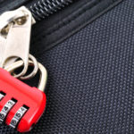 a red lock on a zipper