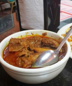 a bowl of soup with a spoon