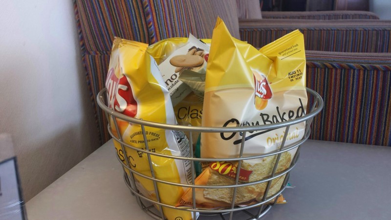 a basket of chips and crackers