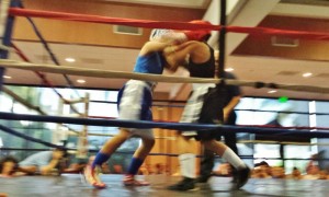 a group of people in a boxing ring