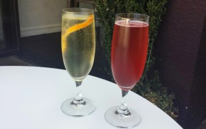 two glasses of liquid on a table