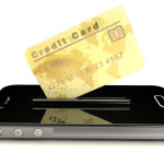 a credit card swiping on a cell phone