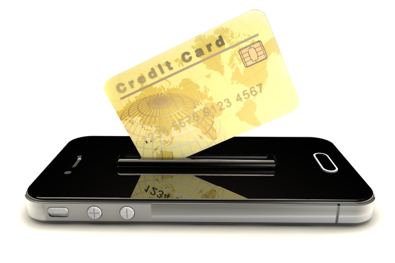 a credit card swiping on a cell phone
