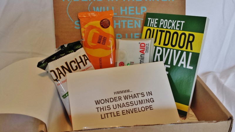 a box with a book and a package