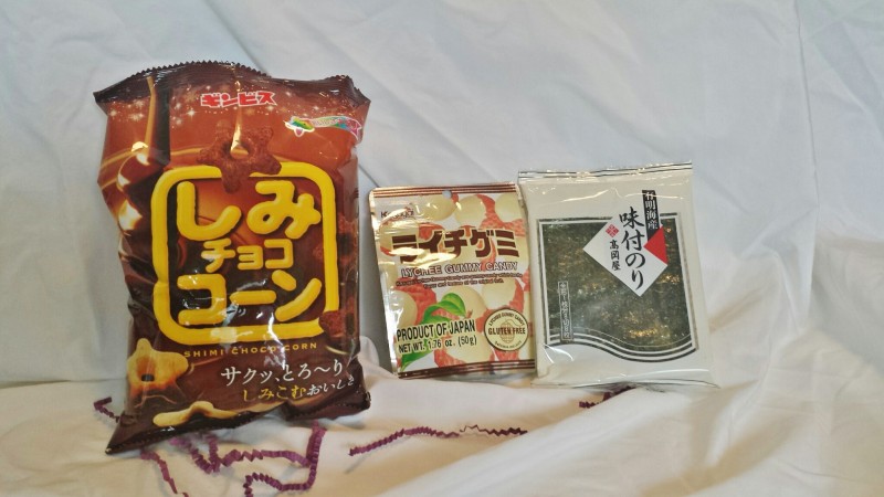 a group of food items on a bed