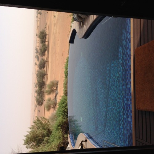 a pool with a view of the desert