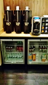 a refrigerator with drinks and beverages
