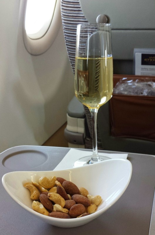 Etihad Business Class AUH MAA nuts and champagne