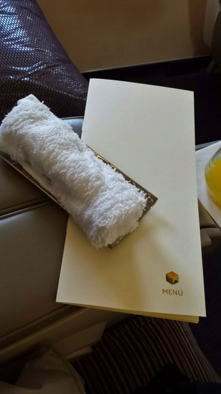 Etihad Business Class AUH MAA towel and menu