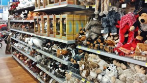 a shelf with stuffed animals